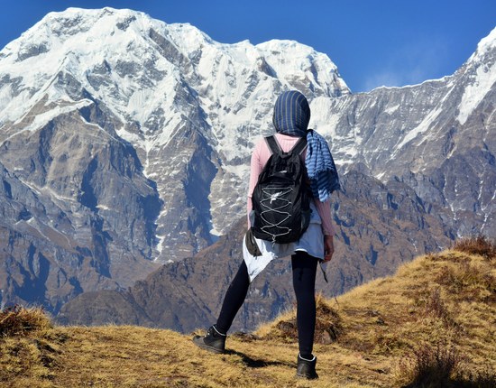 Trekker looking out over the Annapurna range